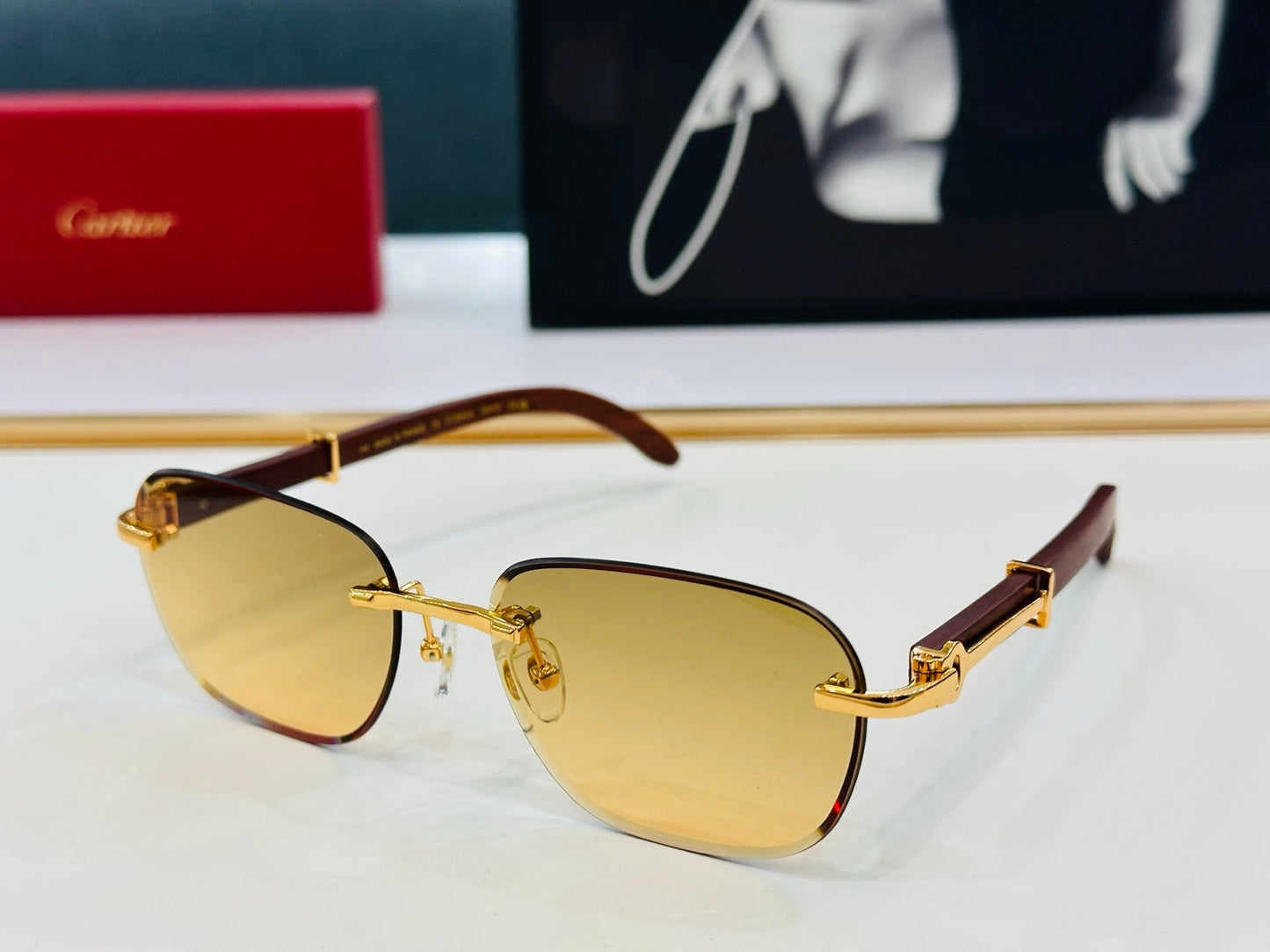 CARTIER RIMLESS SQUARE FRAME SUNGLASSES CT0605S IN METAL AND WOODEN