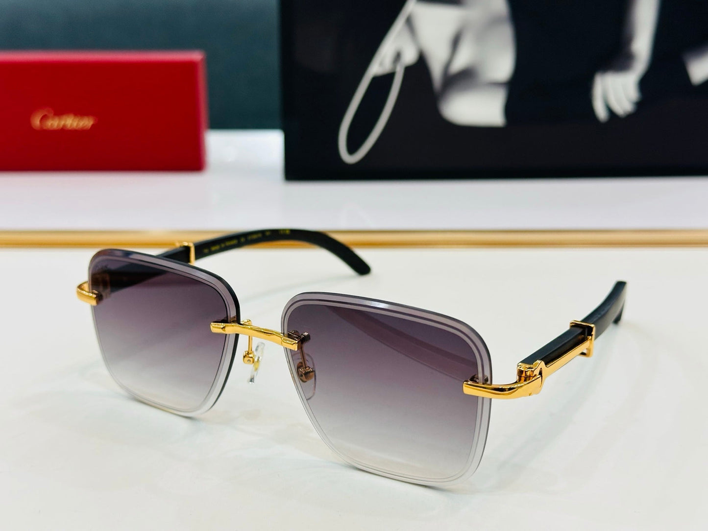 CARTIER RIMLESS RECTANGULAR FRAME SUNGLASSES CT0607S IN METAL AND WOODEN