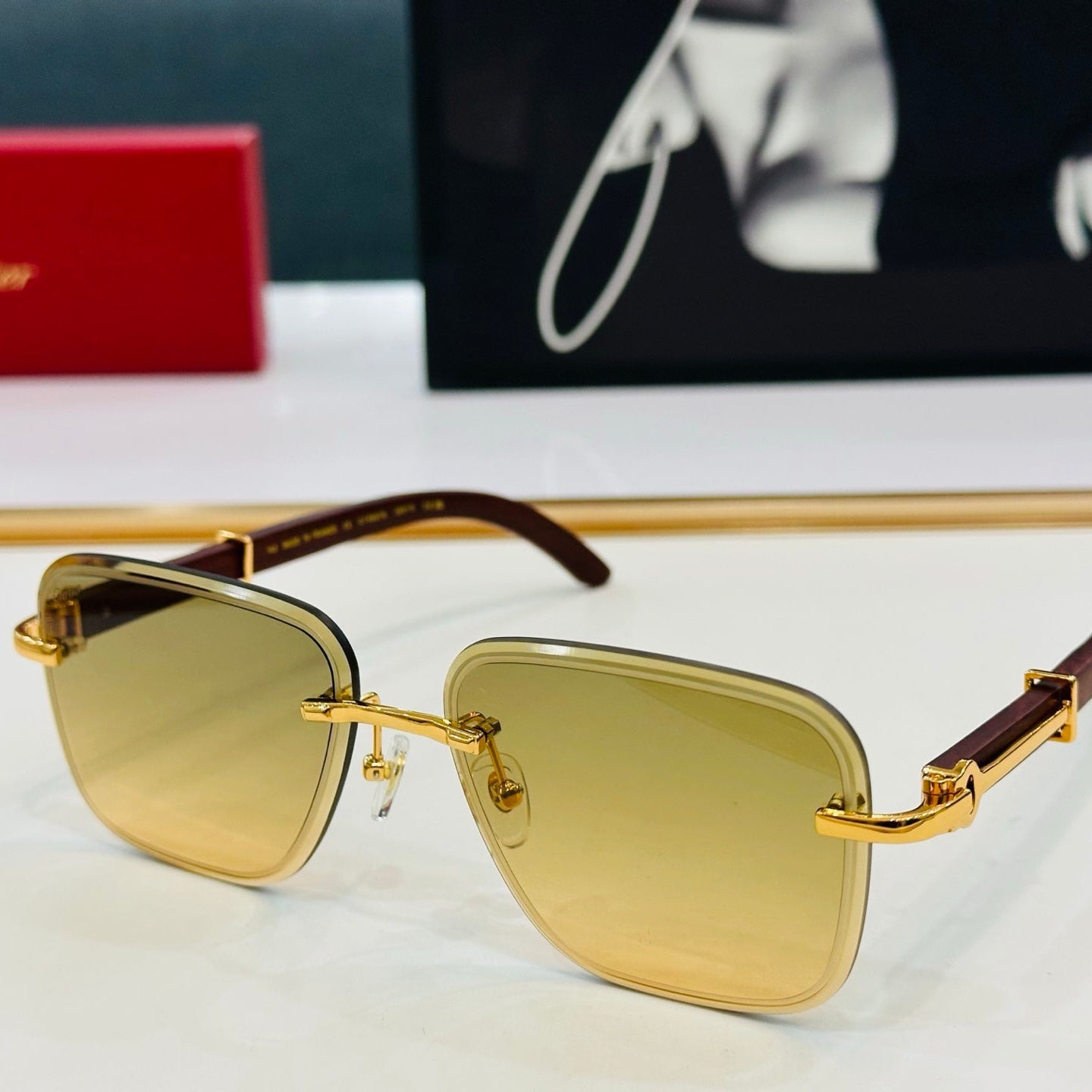 CARTIER RIMLESS RECTANGULAR FRAME SUNGLASSES CT0607S IN METAL AND WOODEN