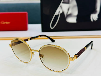 CARTIER PREMIÈRE ROUND FRAME SUNGLASSES CT0490S IN METAL