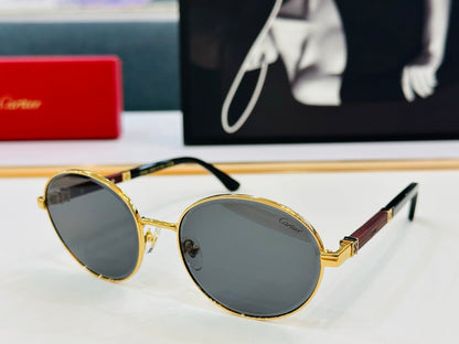 CARTIER PREMIÈRE ROUND FRAME SUNGLASSES CT0490S IN METAL