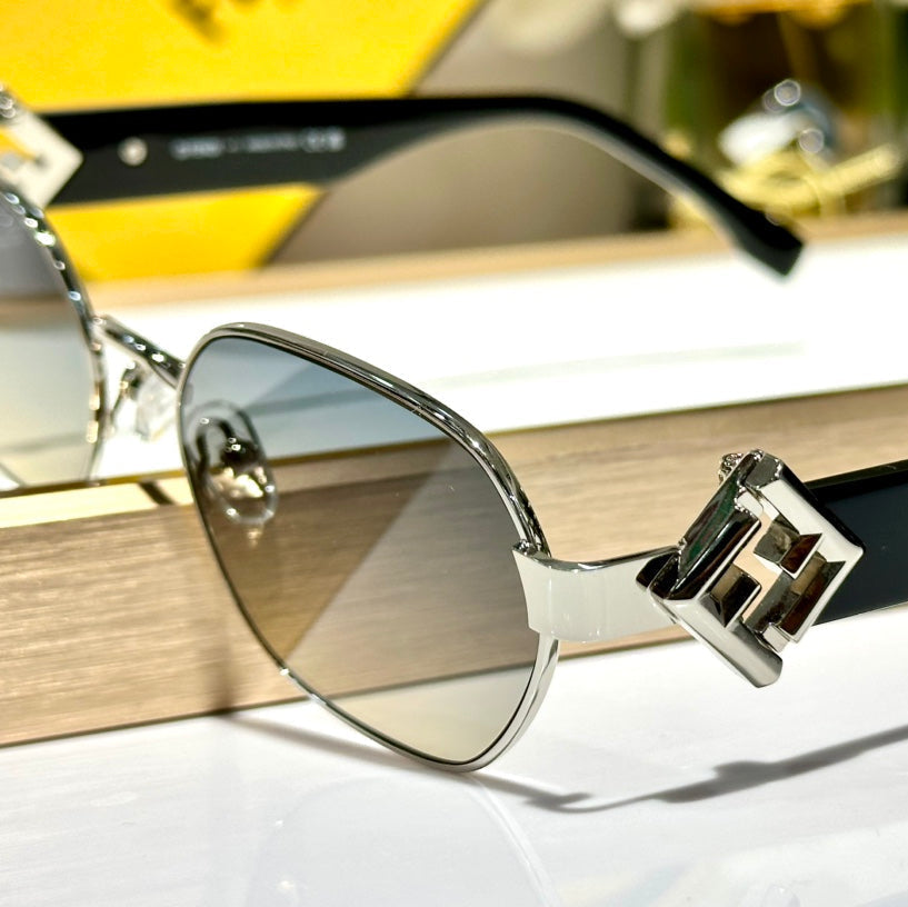 FENDI TRAVEL ROUND FRAME SUNGLASSES FE40148L IN METAL AND ACETATE