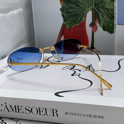 FENDI FIRST CRYSTAL RIMLESS OVAL FRAME SUNGLASSES 557152 IN METAL