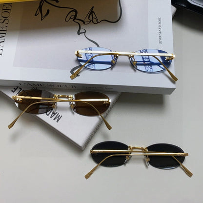 FENDI FIRST CRYSTAL RIMLESS OVAL FRAME SUNGLASSES 557152 IN METAL