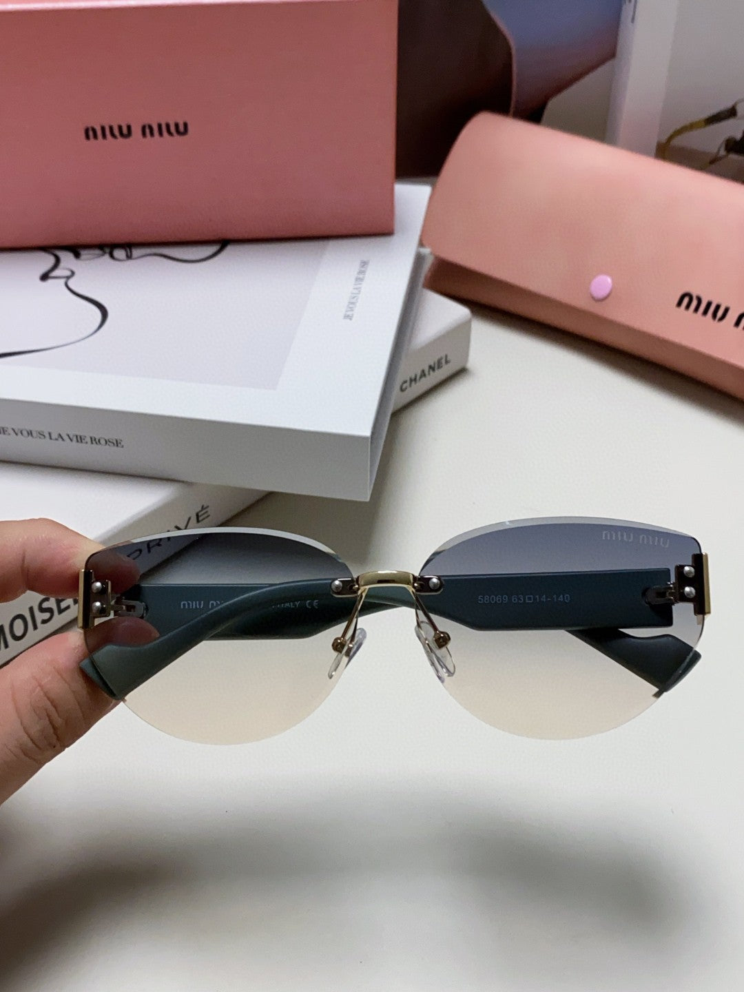 MIU MIU LOGO SUNGLASSES 513012 IN BLUE ACETATE
