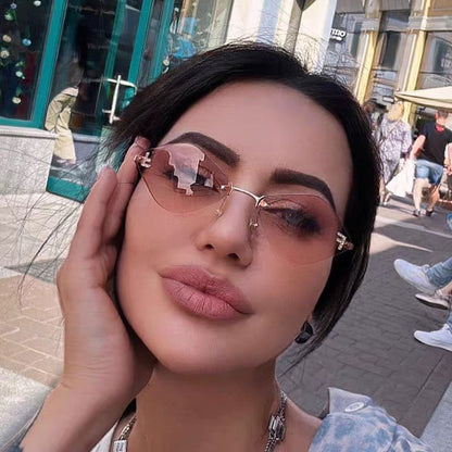 FENDI SKY RIMLESS TRIANGLE FRAME SUNGLASSES 566724 IN METAL