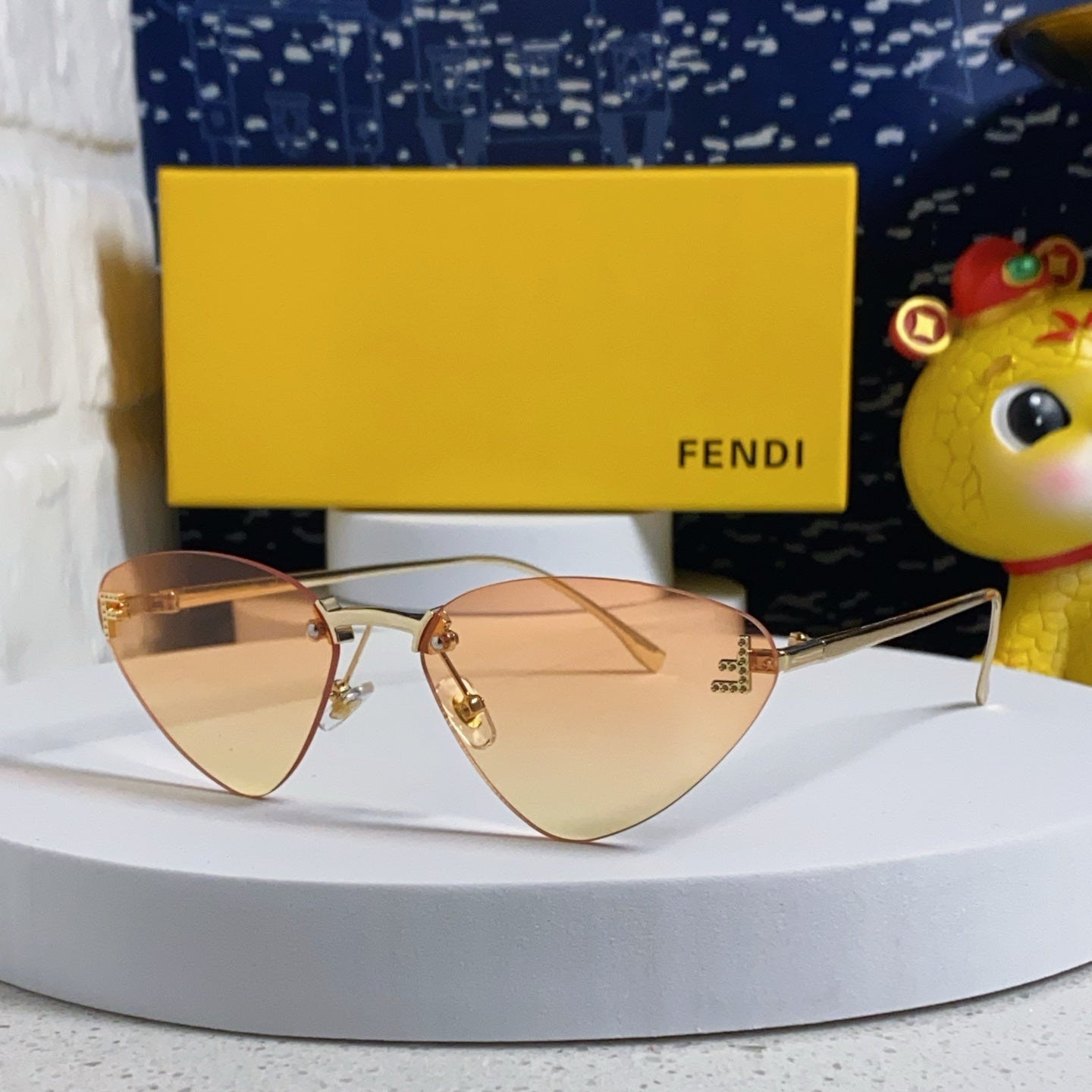 FENDI SKY RIMLESS TRIANGLE FRAME SUNGLASSES 566724 IN METAL