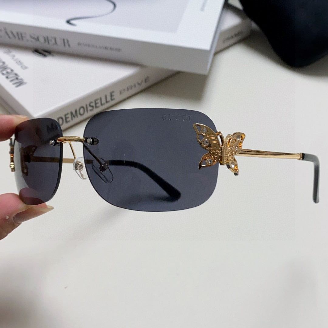 GUCCI BUTTERFLY EMBELLISHED RIMLESS RECTANGULAR FRAME SUNGLASSES 570245 IN METAL