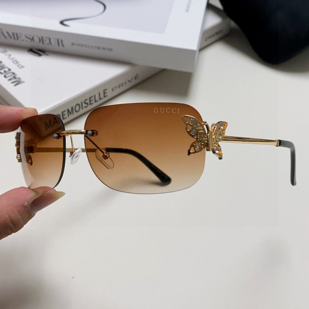 GUCCI BUTTERFLY EMBELLISHED RIMLESS RECTANGULAR FRAME SUNGLASSES 570245 IN METAL