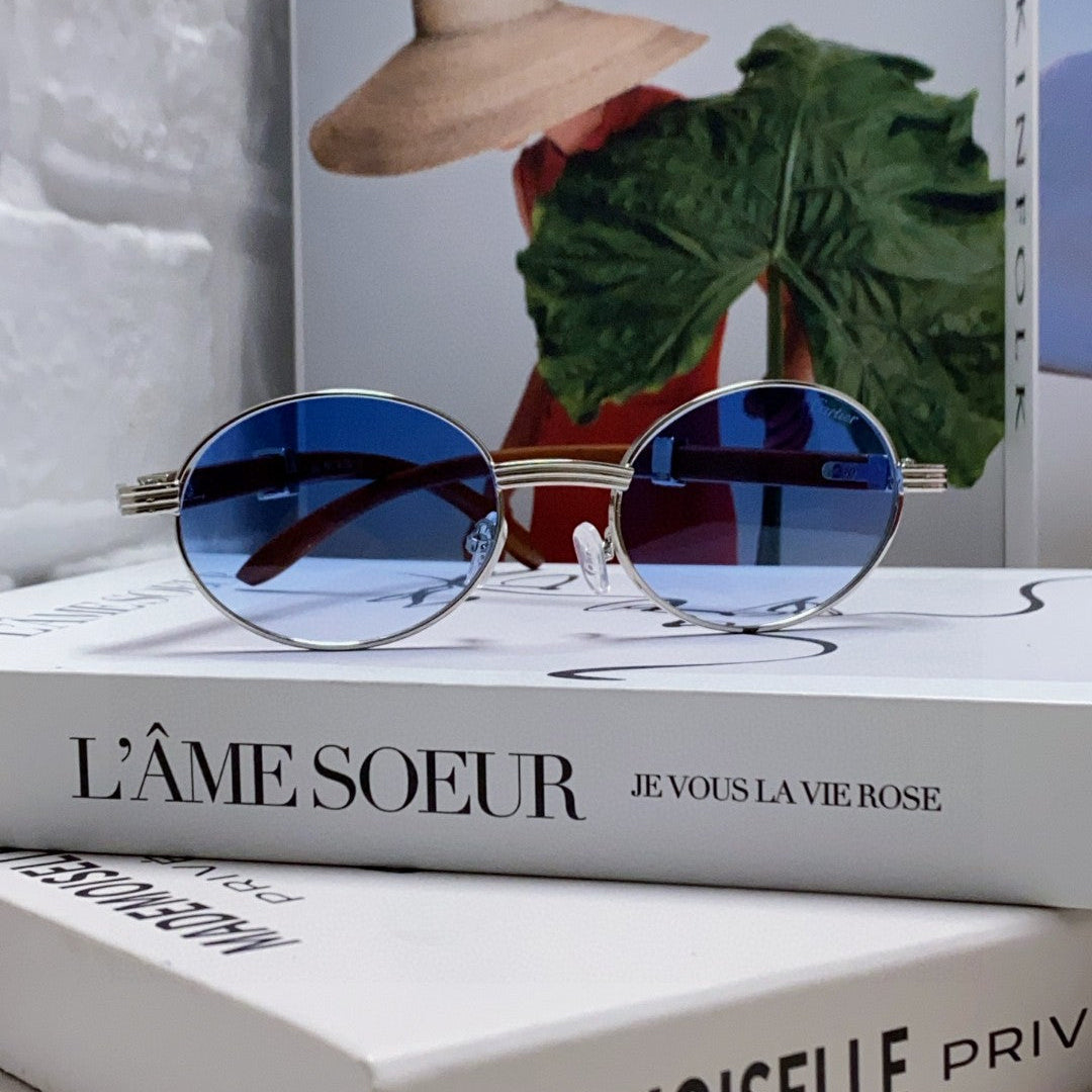CARTIER PREMIÈRE ROUND FRAME SUNGLASSES CT0464S IN METAL