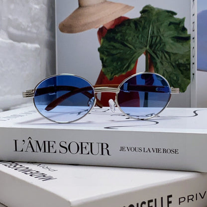 CARTIER PREMIÈRE ROUND FRAME SUNGLASSES CT0464S IN METAL