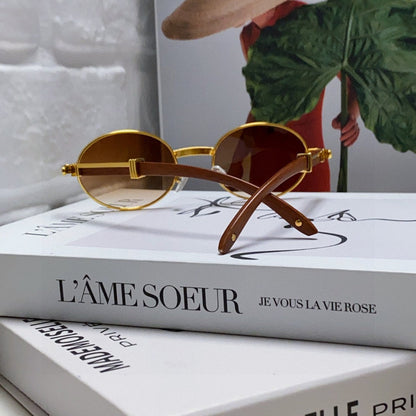 CARTIER PREMIÈRE ROUND FRAME SUNGLASSES CT0464S IN METAL