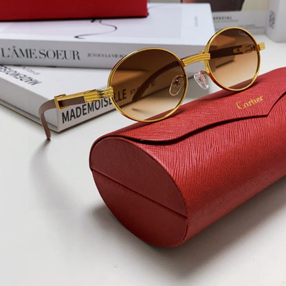 CARTIER PREMIÈRE ROUND FRAME SUNGLASSES CT0464S IN METAL