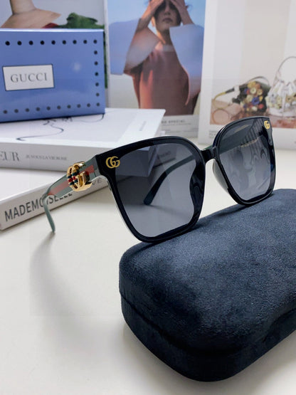 GUCCI EMBOSSED LOGO BUTTERFLY FRAME SUNGLASSES 576876 IN ACETATE