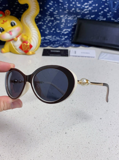 CHANEL OVAL SUNGLASSES 640343 IN IVORY BROWN ACETATE METAL FRAME EMBOSSED PEARL