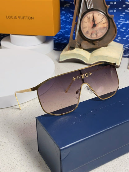 LOUIS VUITTON GOLDEN MASK SUNGLASSES 582732 IN GOLD METAL DARK GREY SMOKE LENSES