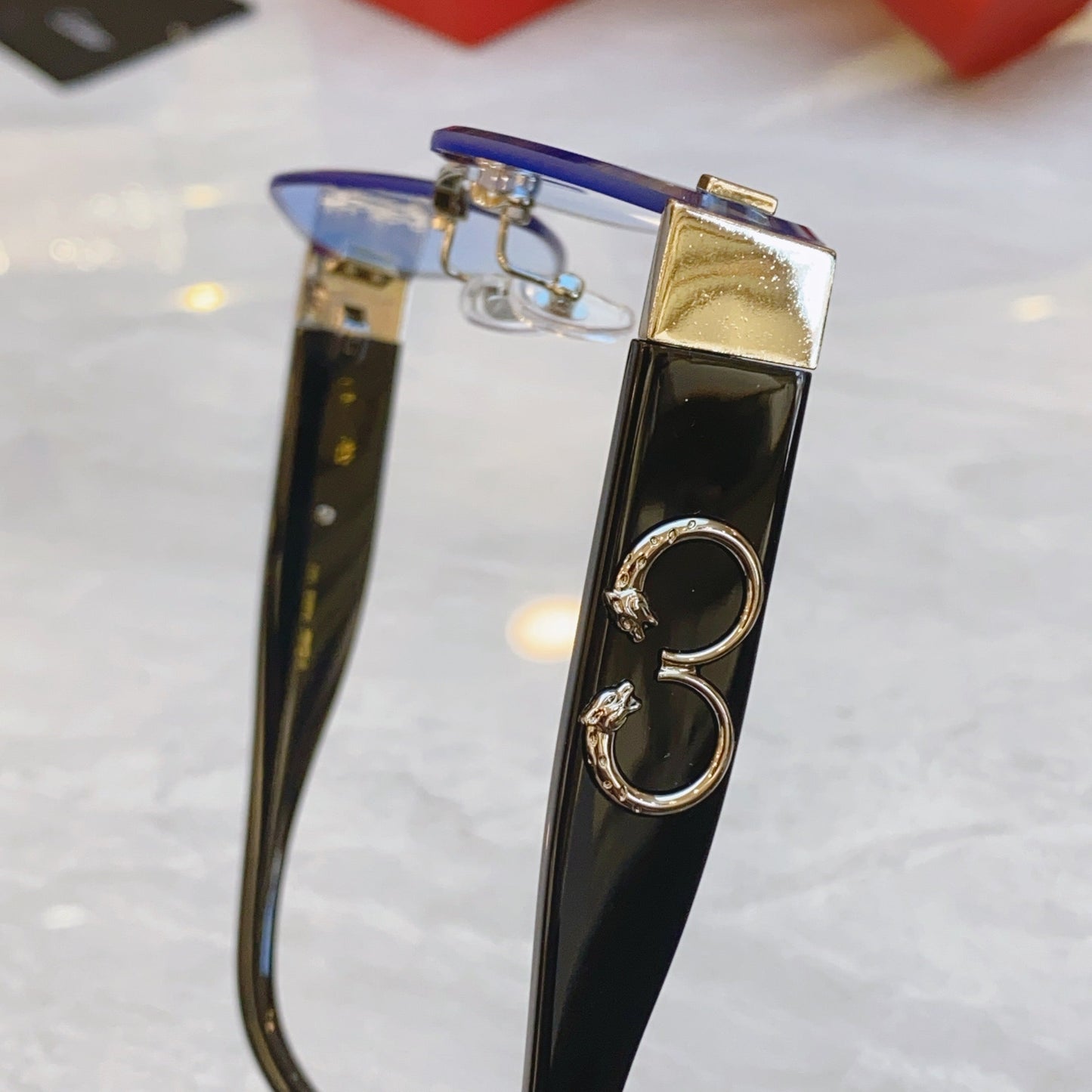 CARTIER PANTHÈRE RHOMBUS FRAME SUNGLASSES CT00638S IN METAL AND ACETATE