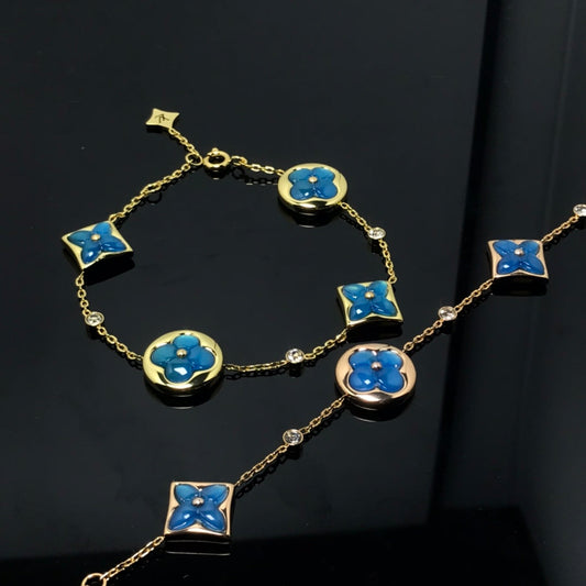 LOUIS VUITTON STAR AND SUN 4 MOTIF BLUE BRACELET