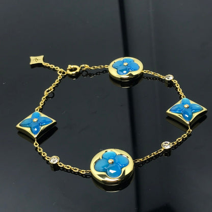 LOUIS VUITTON STAR AND SUN 4 MOTIF BLUE BRACELET