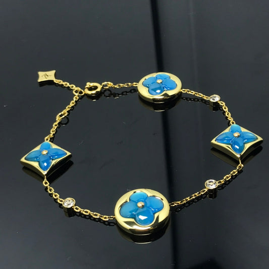 LOUIS VUITTON STAR AND SUN 4 MOTIF BLUE BRACELET