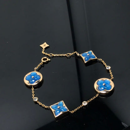 LOUIS VUITTON STAR AND SUN 4 MOTIF BLUE BRACELET