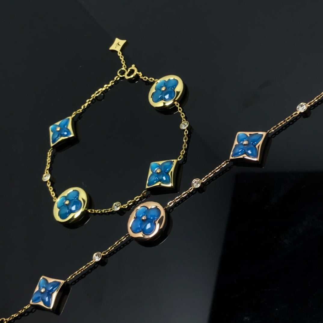 LOUIS VUITTON STAR AND SUN 4 MOTIF BLUE BRACELET